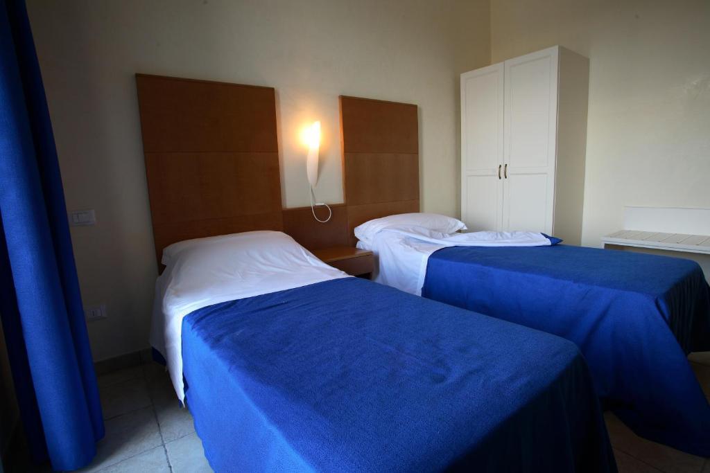 Hotel Resort Portoselvaggio Sant Isidoro  Pokoj fotografie